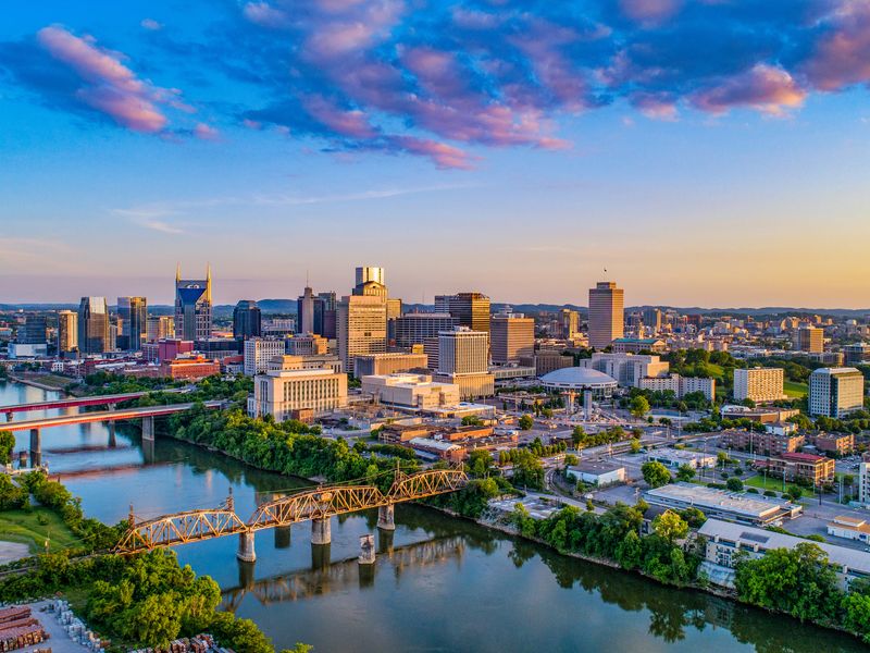 Aerial view of Nashville, Tennessee city skyline at sunset