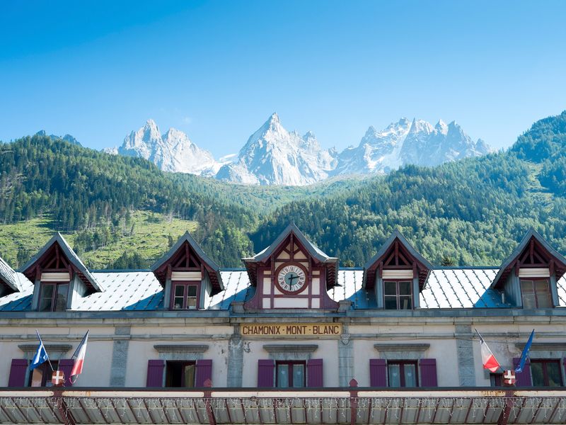 Chamonix-Mont-Blanc train station with a view of the French Alps in the background.