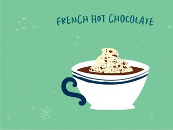 A cup of French hot chocolate with whipped cream and chocolate shavings.