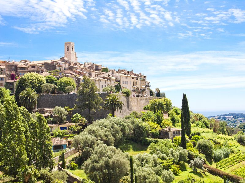 A view of the medieval village of Saint-Paul-de-Vence in the French Riviera, overlooking the Mediterranean Sea.