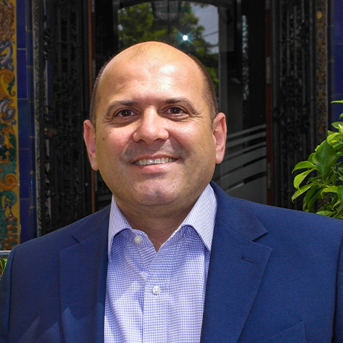 Smiling Man in Blue Suit