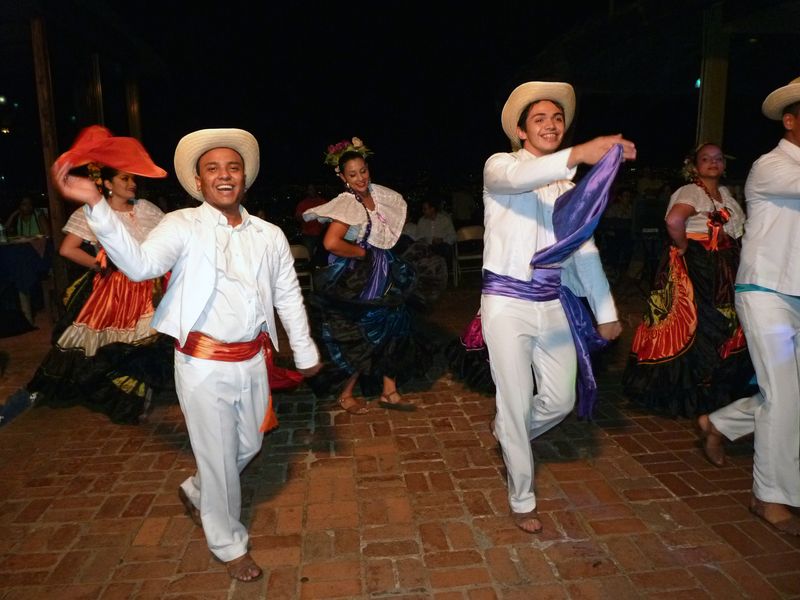 Young adults perform traditional dance