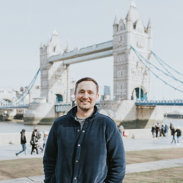 Man in front of Tower Bridge