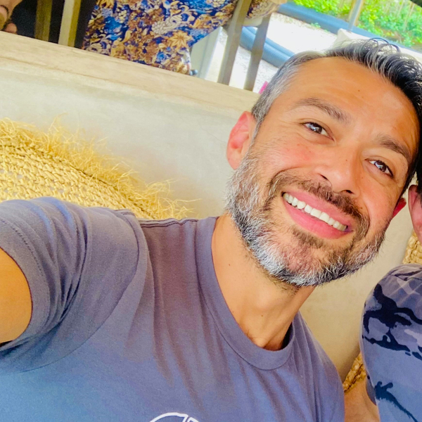 Smiling Man in Austin T-Shirt