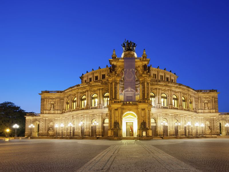 The Semper Opera House in Dresden, Germany illuminated at night.