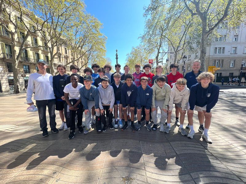 Group photo of teenagers and adults in Barcelona, Spain