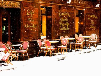 Snow-covered cafe in Paris