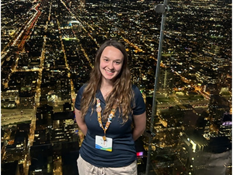 Night City View with Smiling Woman