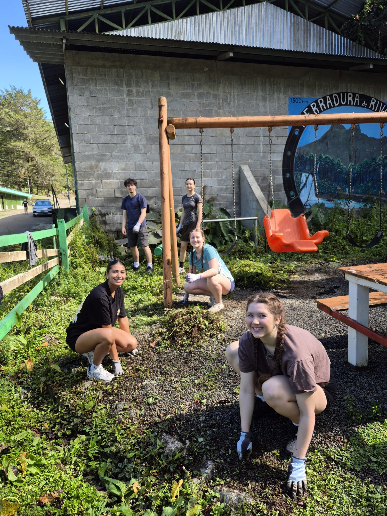 Community Volunteers Beautifying an Outdoor Area in Costa Rica
