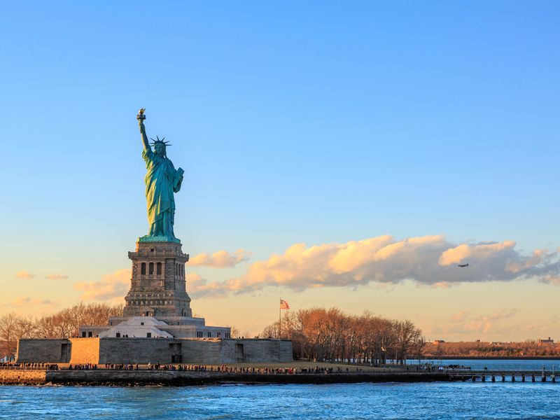 The Statue of Liberty at sunset.