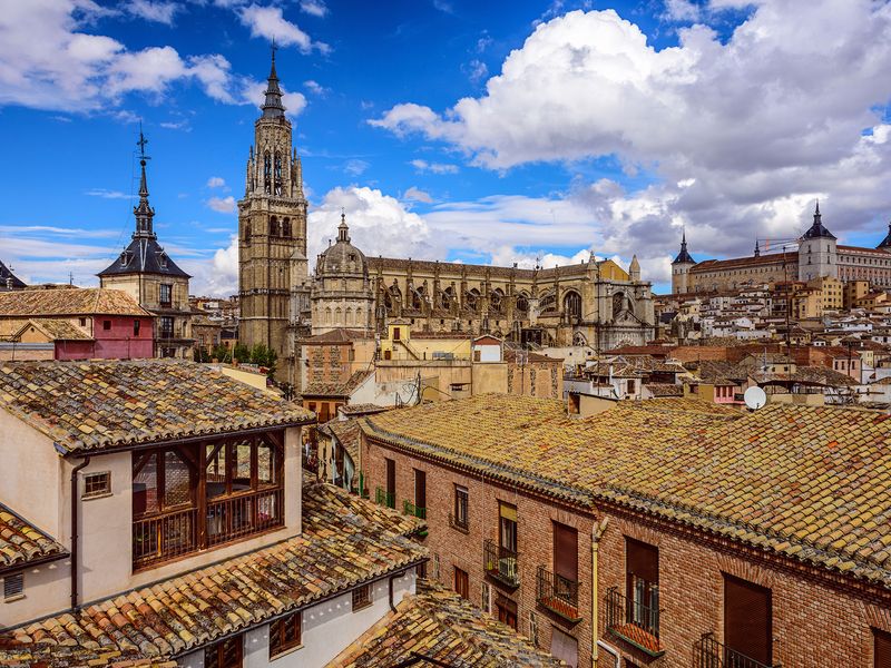 Toledo, Spain cityscape with the Cathedral and Alcazar of Toledo.