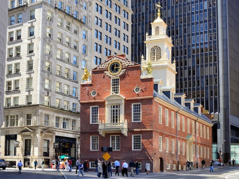 The Old State House in Boston, Massachusetts, with modern skyscrapers in the background.