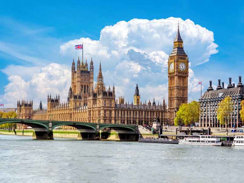 The Houses of Parliament and Big Ben in London, England, on a sunny day.