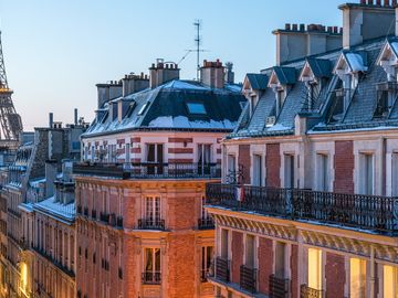 Paris Rooftop View of Eiffel Tower at Dusk