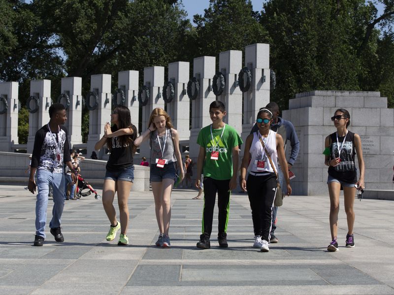 A group of teenagers visit the World War II Memorial in Washington, D.C.