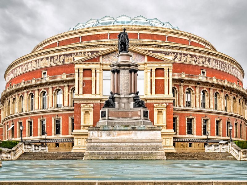 The Royal Albert Hall in London, England, a grand Victorian concert hall known for hosting the Proms and various performances.