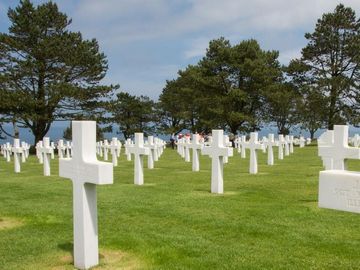 Rows of white crosses in the Normandy American Cemetery and Memorial.