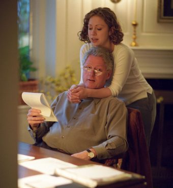 Bill and Chelsea Clinton Reading a Letter