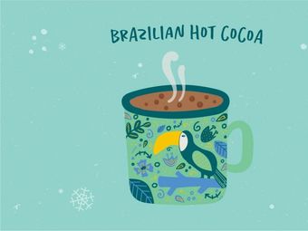 Steaming mug of Brazilian hot cocoa with a toucan design.