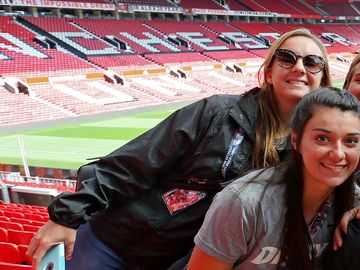 Group of young women at Old Trafford Stadium in Manchester, England