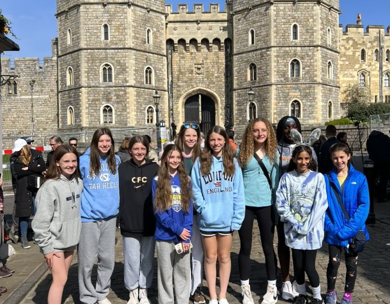 Group of teenage girls in front of Windsor Castle.