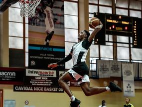 Basketball player dunking