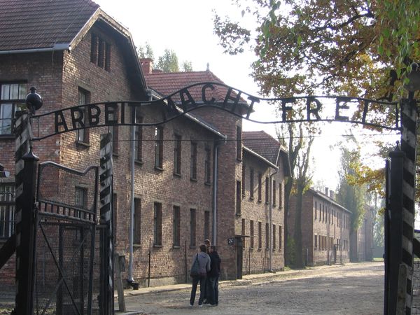 entrance to the main camp, Auschwitz I - The sign "Arbeit Macht Frei", which means "work makes (one) free,