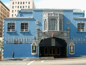 Blue exterior of a movie theater in Hollywood.