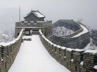 The Great Wall of China covered in snow.