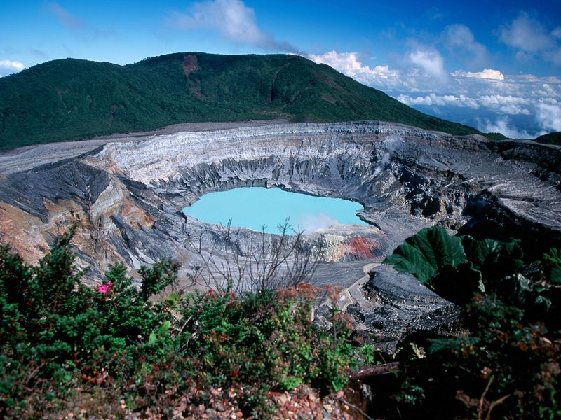 Aerial view of the turquoise crater lake in Poás Volcano, Costa Rica.