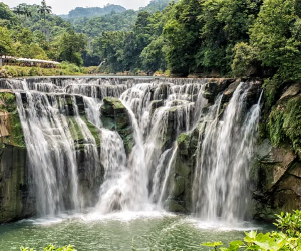 A wide shot of Shifen Waterfall in Pingxi District near Taipei, Taiwan.